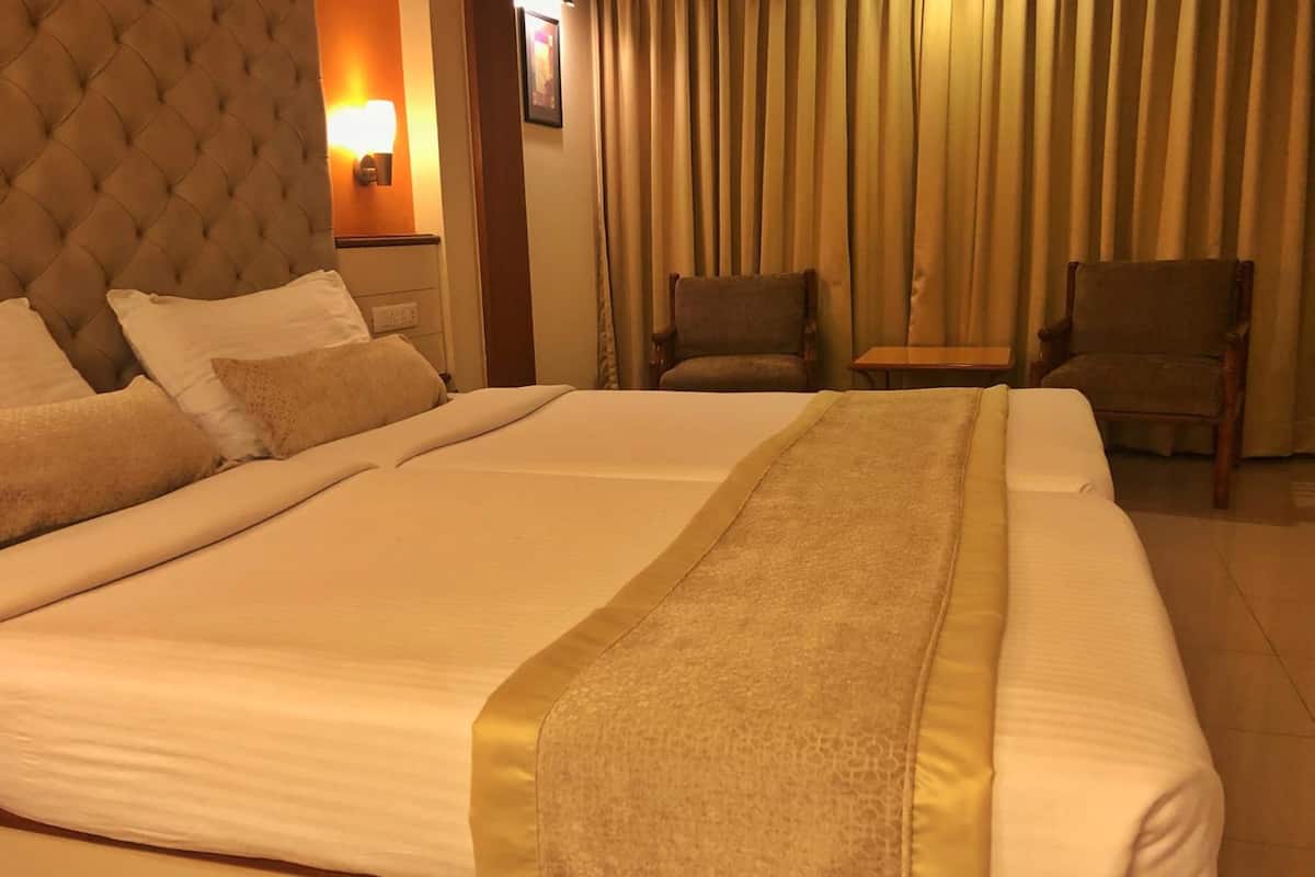 premium bedding, memory-foam beds, minibar, in-room safe