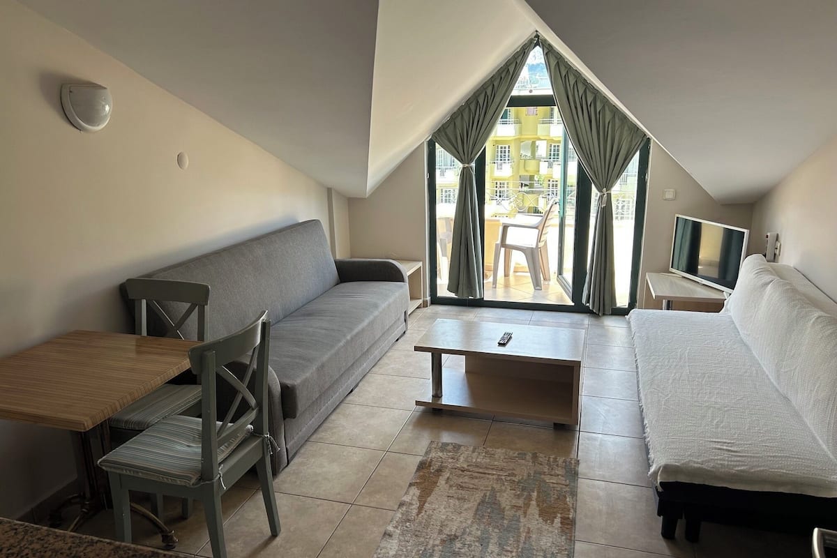 Standard Apartment | Minibar, in-room safe, iron/ironing board, free WiFi