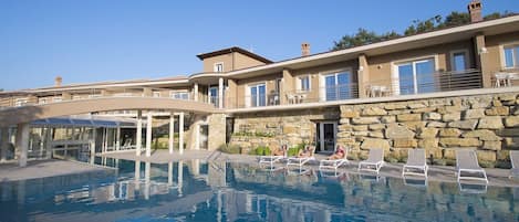 Indoor pool, outdoor pool, open 10:00 AM to 7:00 PM, sun loungers