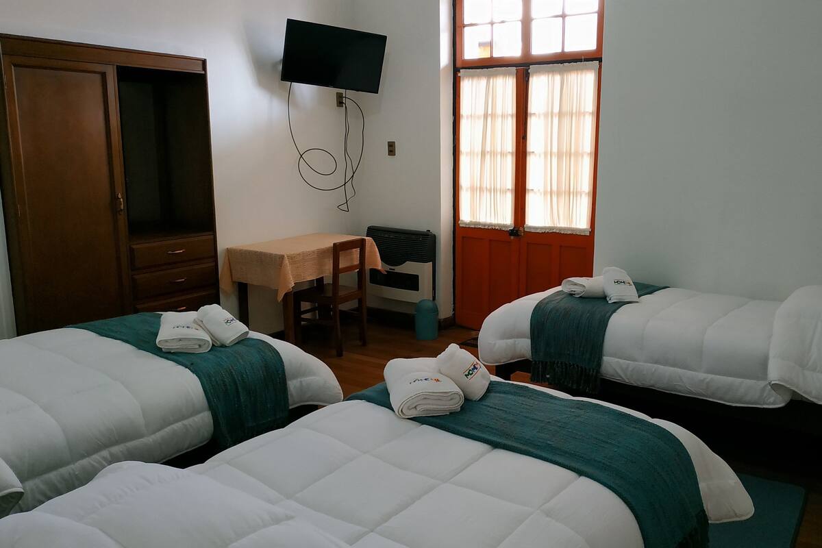 Triple Room, Private Bathroom | In-room safe, individually furnished, desk, laptop workspace