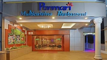 A restaurant entrance with a sign reading "Pannari Multicuisine Restaurant."