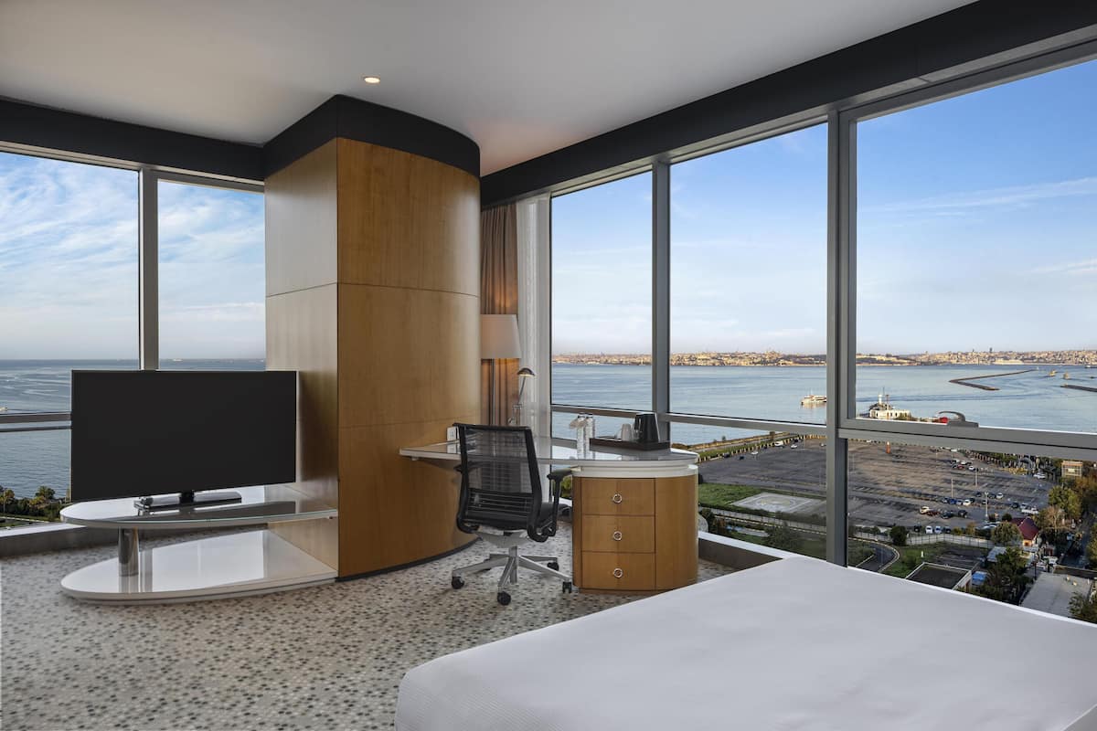 Junior Suite, 1 King Bed, Sea View | Premium bedding, in-room safe, laptop workspace, blackout drapes