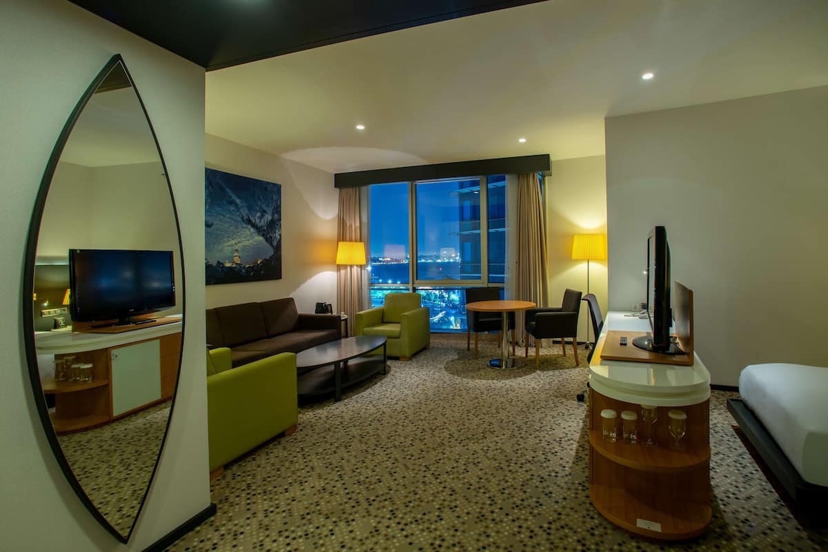Junior Suite, 2 Twin Beds, Sea View | Living area | MP3 dock