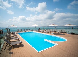 Indoor pool, seasonal outdoor pool, pool umbrellas, sun loungers
