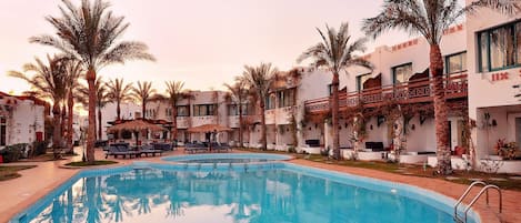 2 outdoor pools, pool umbrellas, sun loungers