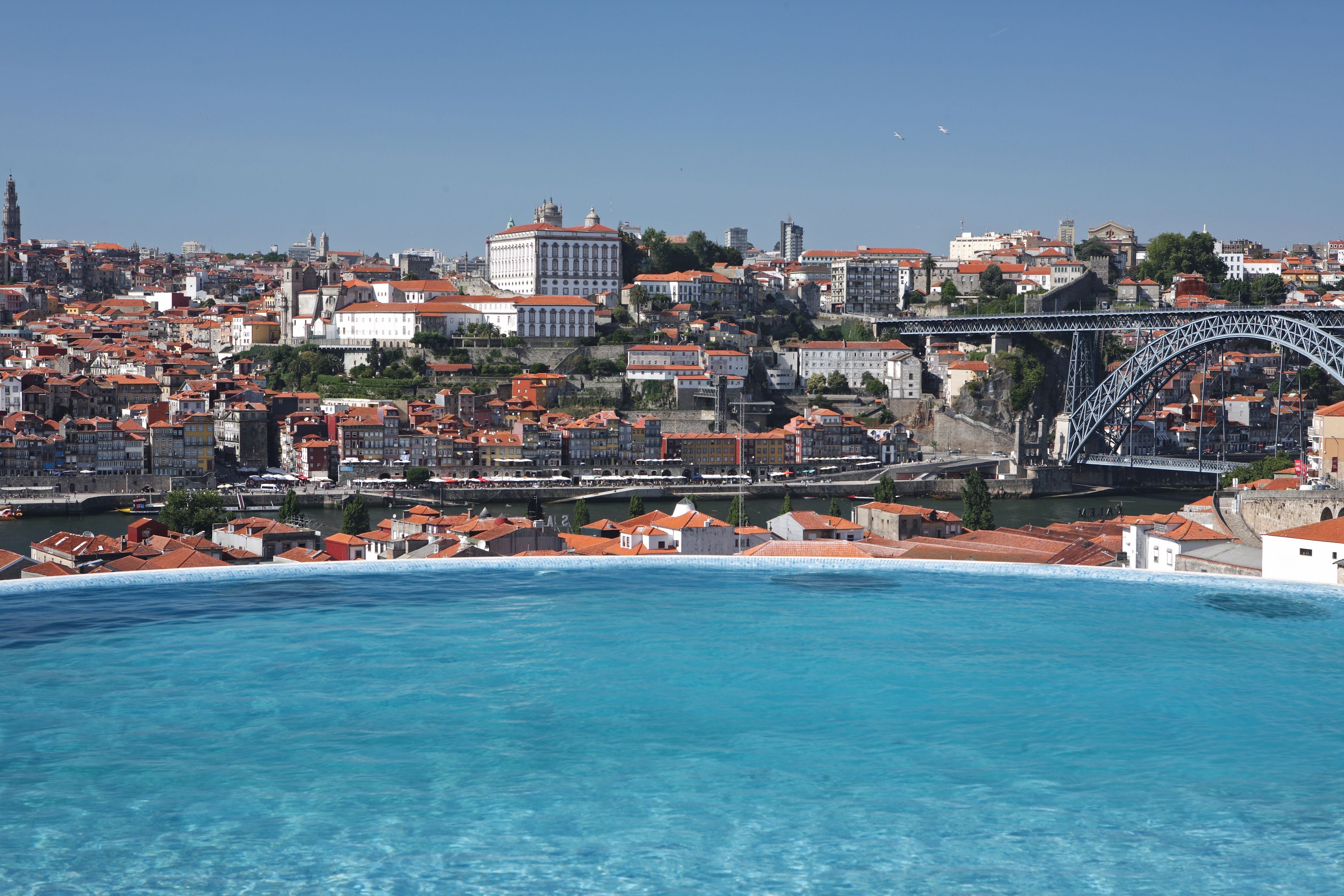 Indoor pool, seasonal outdoor pool, pool umbrellas, pool loungers