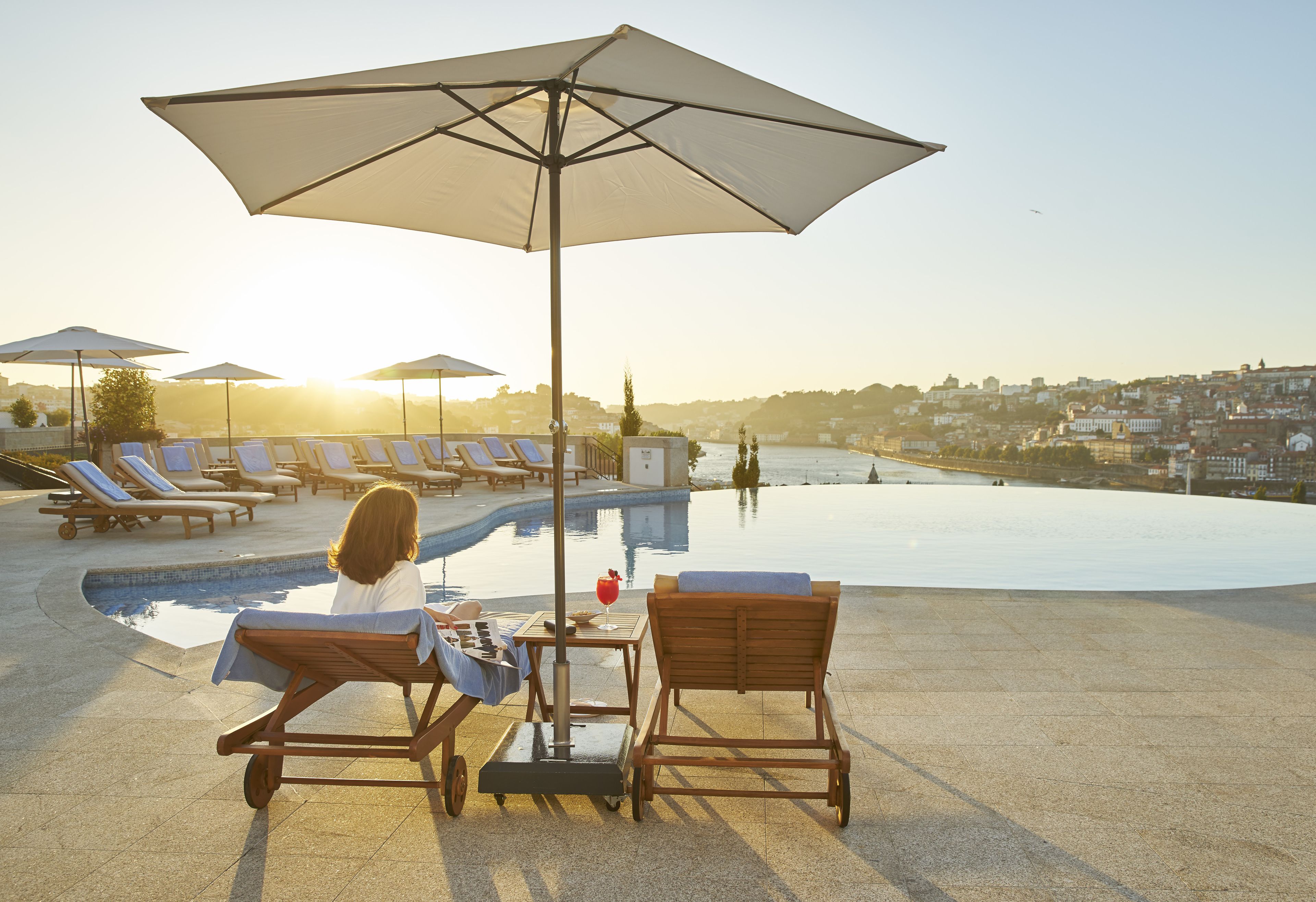 Indoor pool, seasonal outdoor pool, pool umbrellas, sun loungers