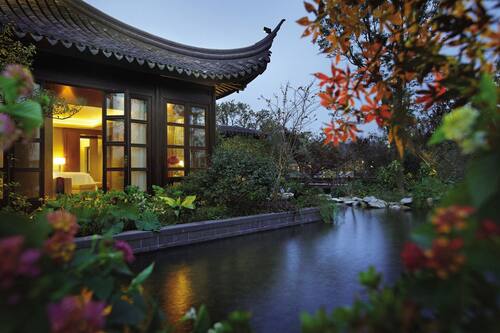 West Lake Suite | Hypo-allergenic bedding, down comforters, minibar, in-room safe