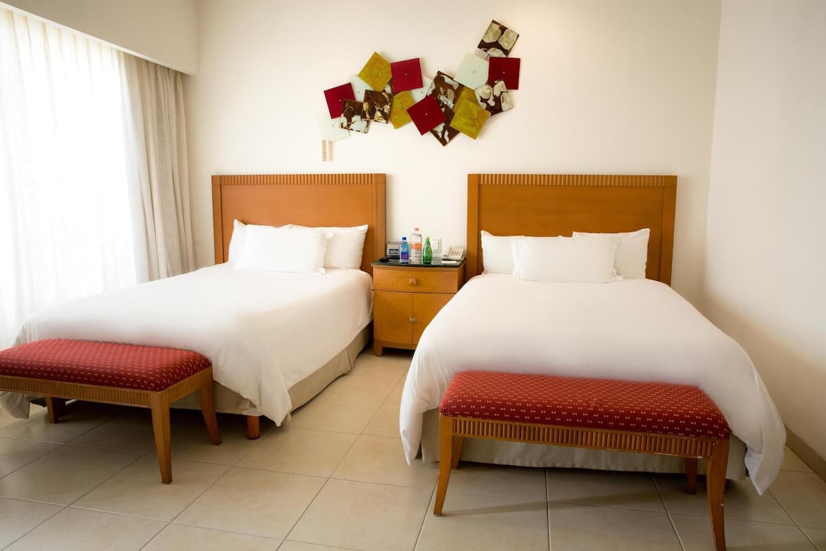Premium bedding, down duvets, minibar, in-room safe