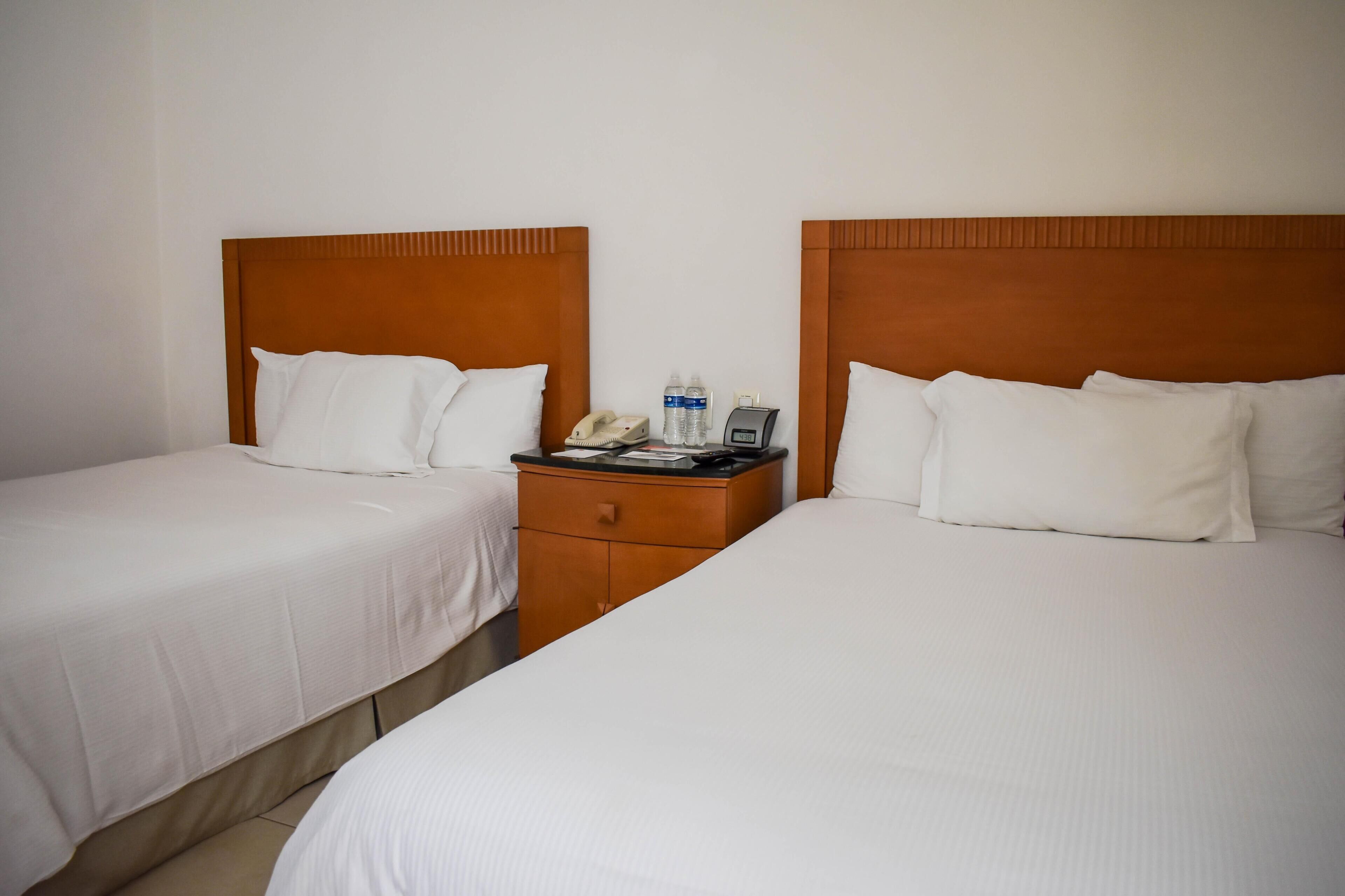 Premium bedding, down duvets, minibar, in-room safe