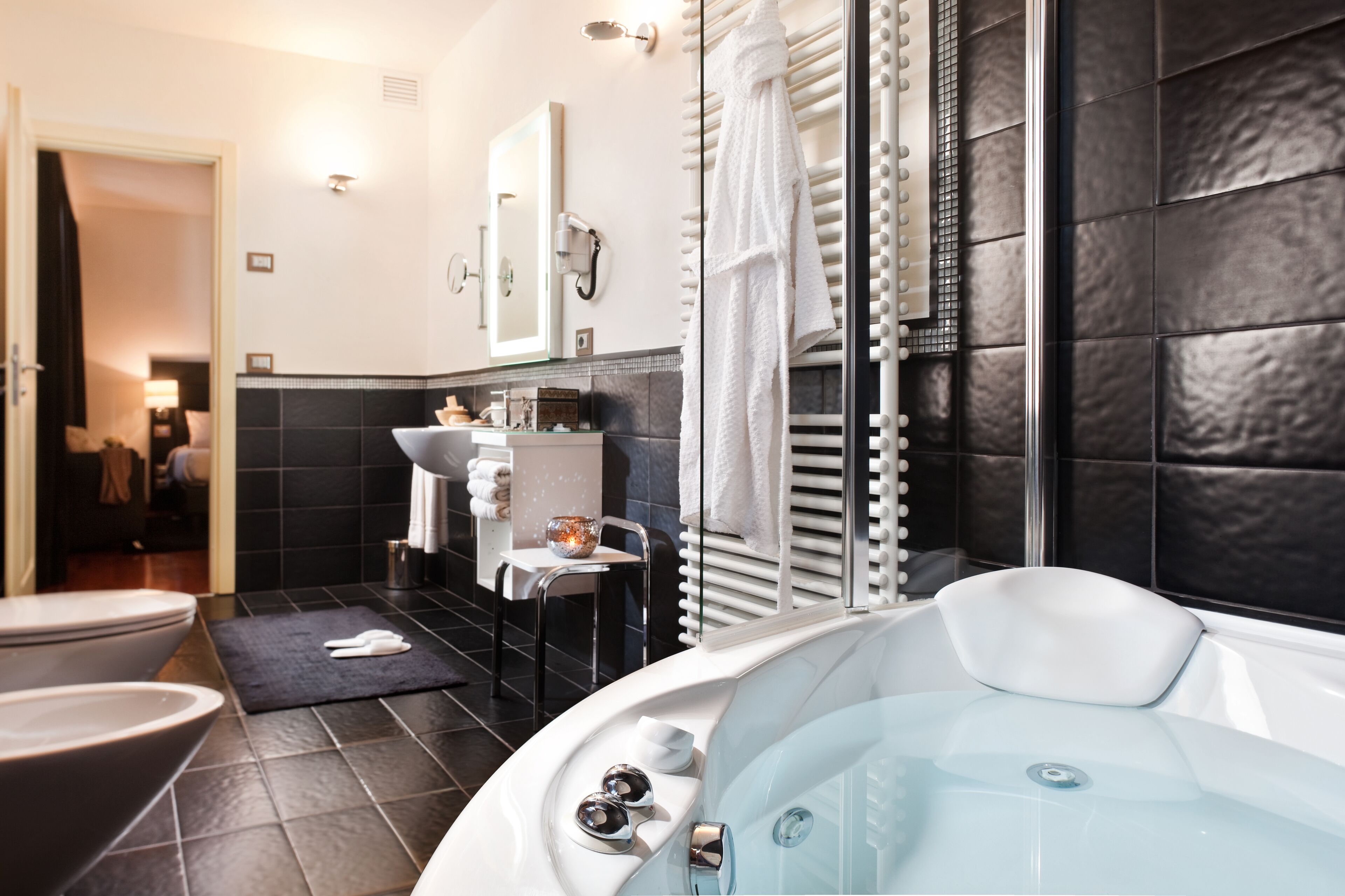deluxe room | bathroom | free toiletries, hair dryer, slippers, bidet