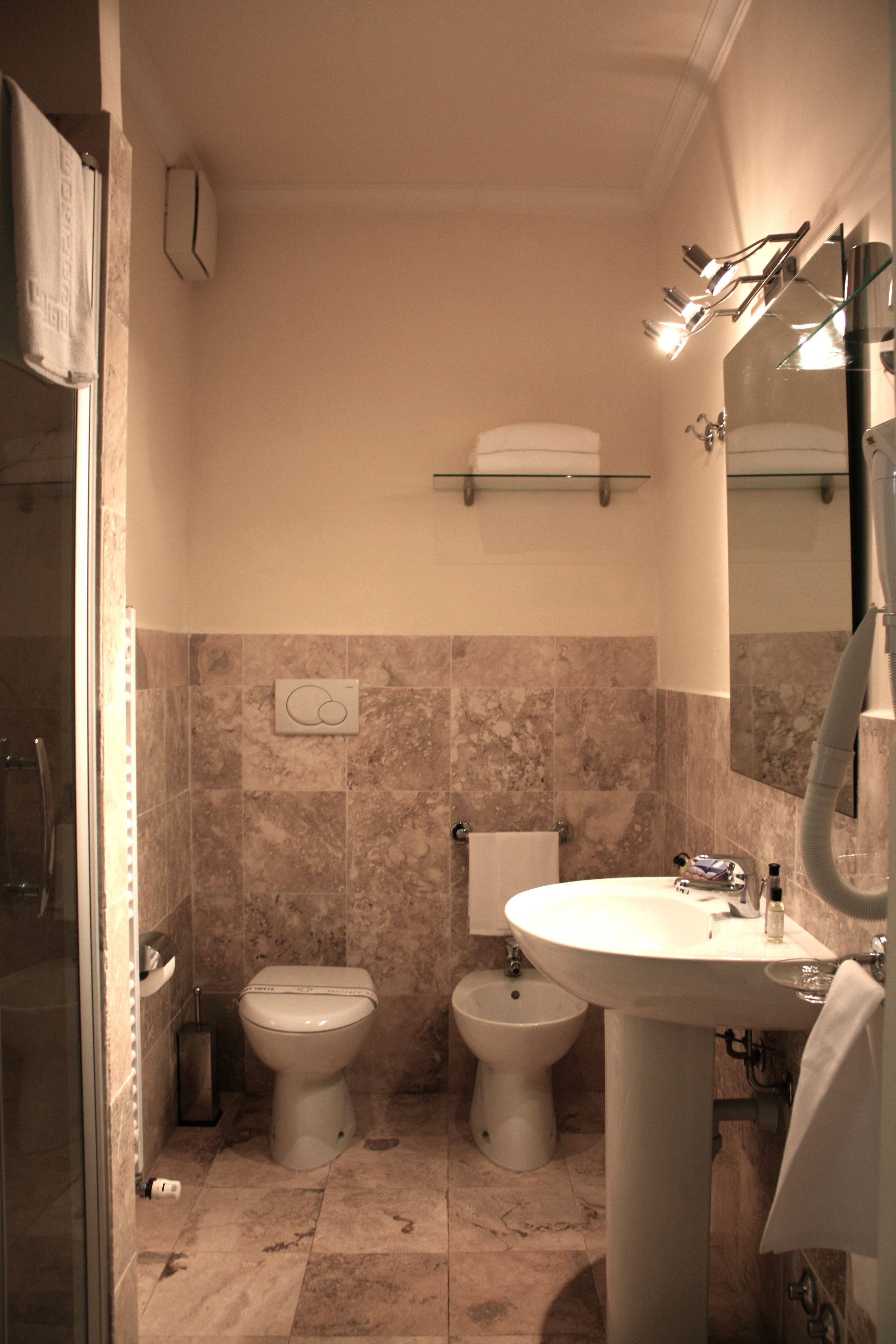 shower, designer toiletries, hair dryer, bidet