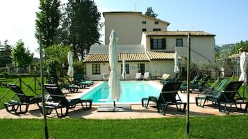 Seasonal outdoor pool, open 8:00 AM to 8:00 PM, free pool cabanas