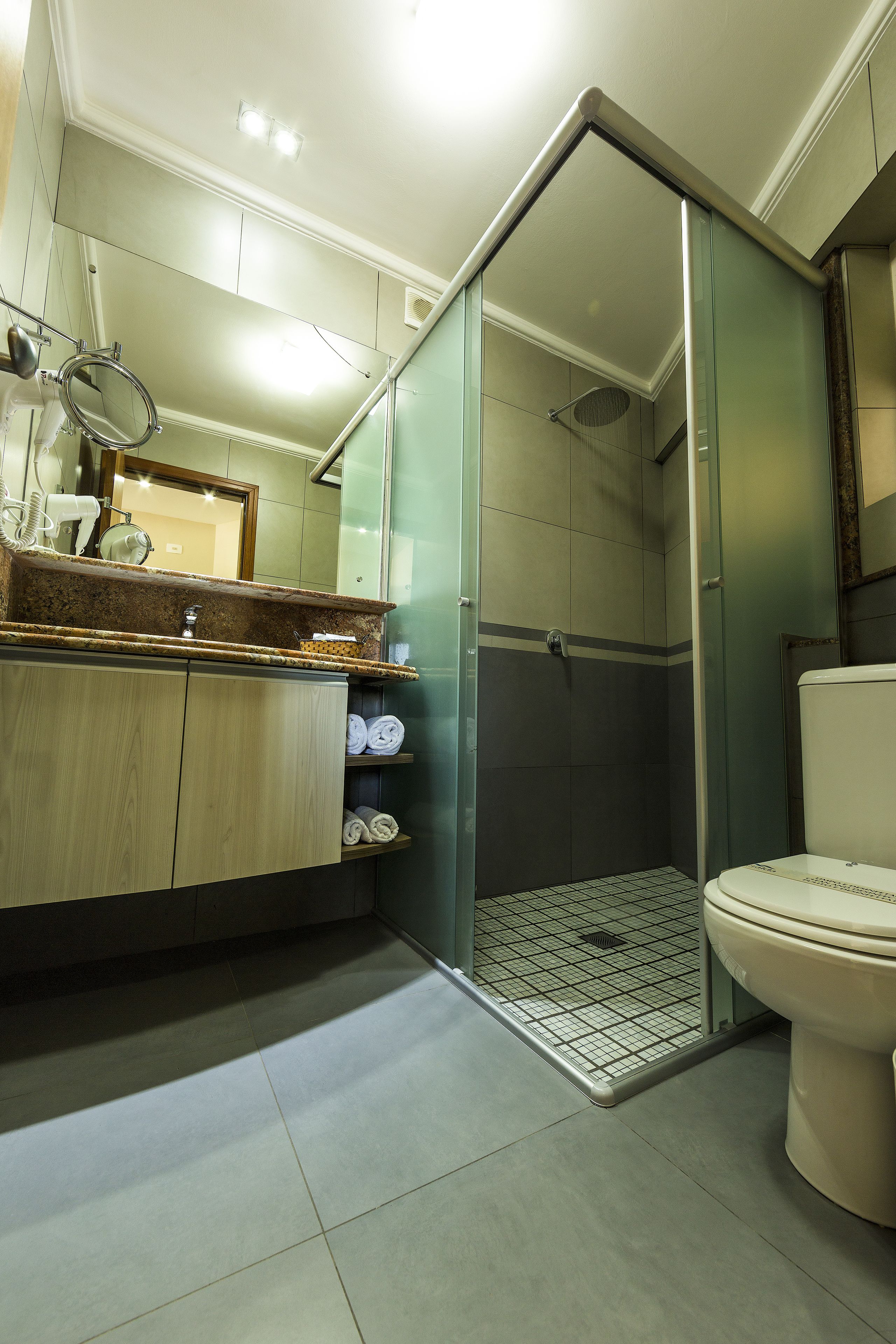 shower, designer toiletries, hair dryer, towels