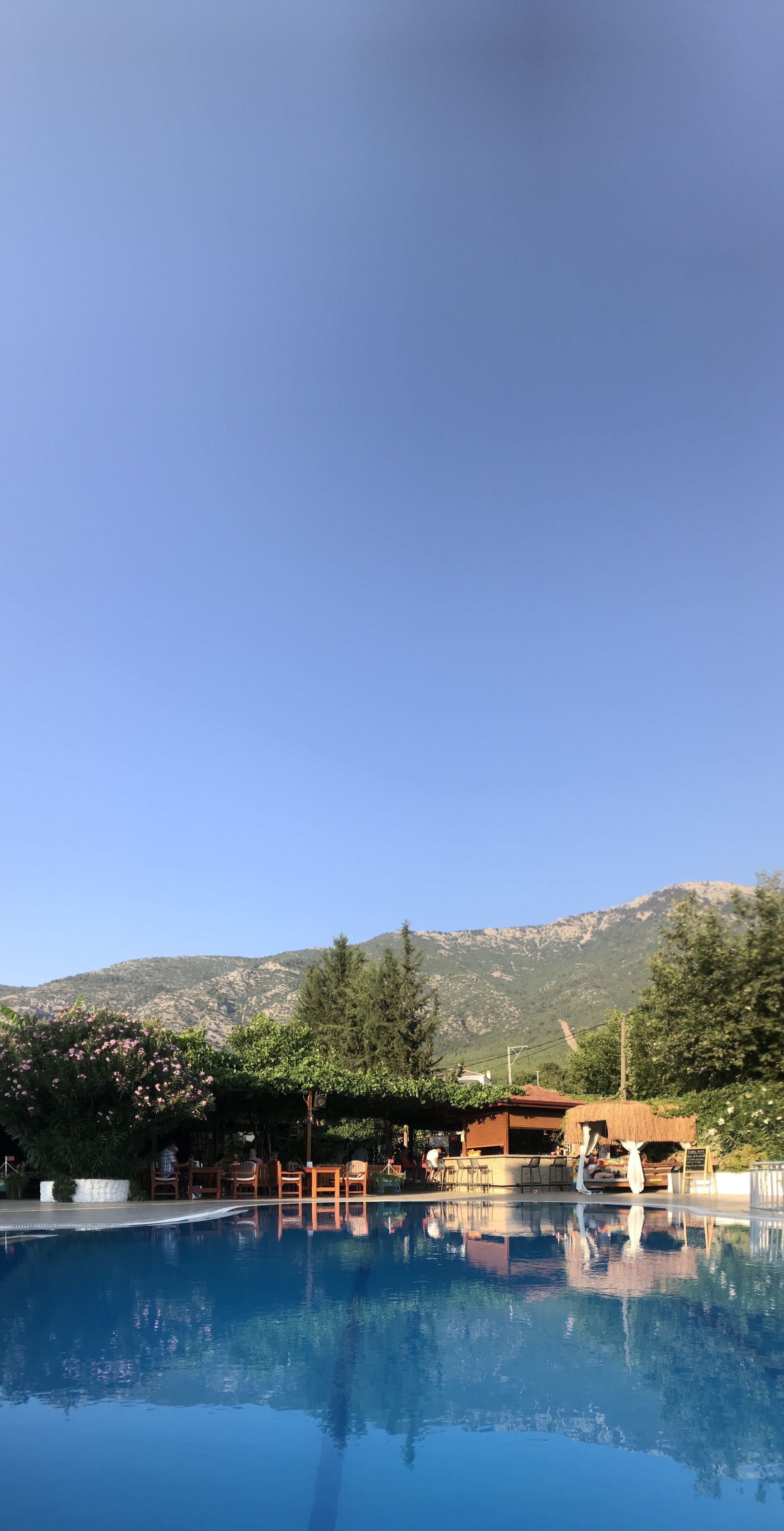 seasonal outdoor pool, pool umbrellas