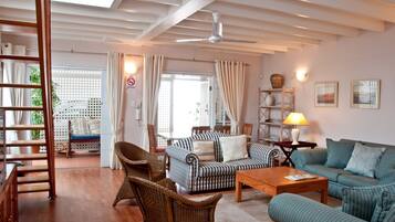 Luxury Apartment (Self Catering) | Living area | Flat-screen TV