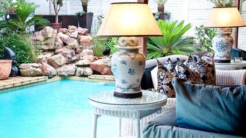 Outdoor pool, pool umbrellas, sun loungers