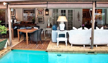 Outdoor pool, pool umbrellas, pool loungers