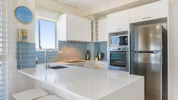 Two-Bedroom Apartment -Rooftop | Private kitchen | Full-sized fridge, microwave, stovetop, dishwasher