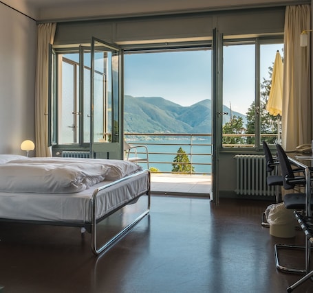 Single Room, Shared Bathroom (Bauhaus with Lake View) | Hypo-allergenic bedding, desk, laptop workspace, iron/ironing board. Monte Verità