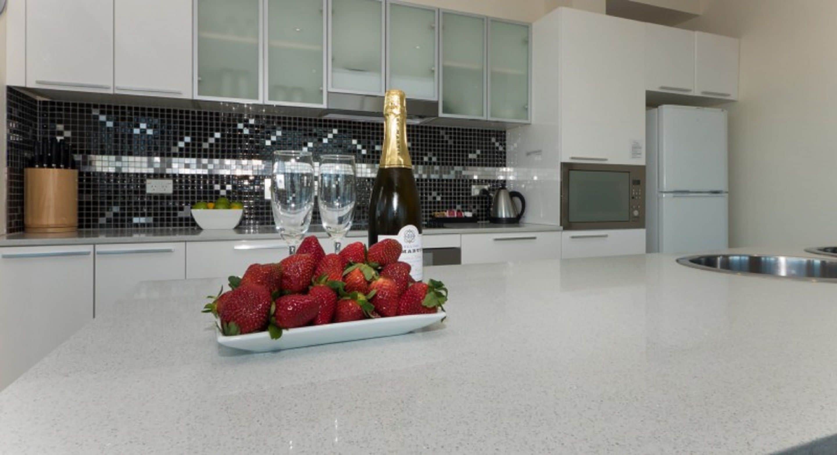 2 Bedroom Deluxe | Private kitchen | Fridge, microwave, electric kettle