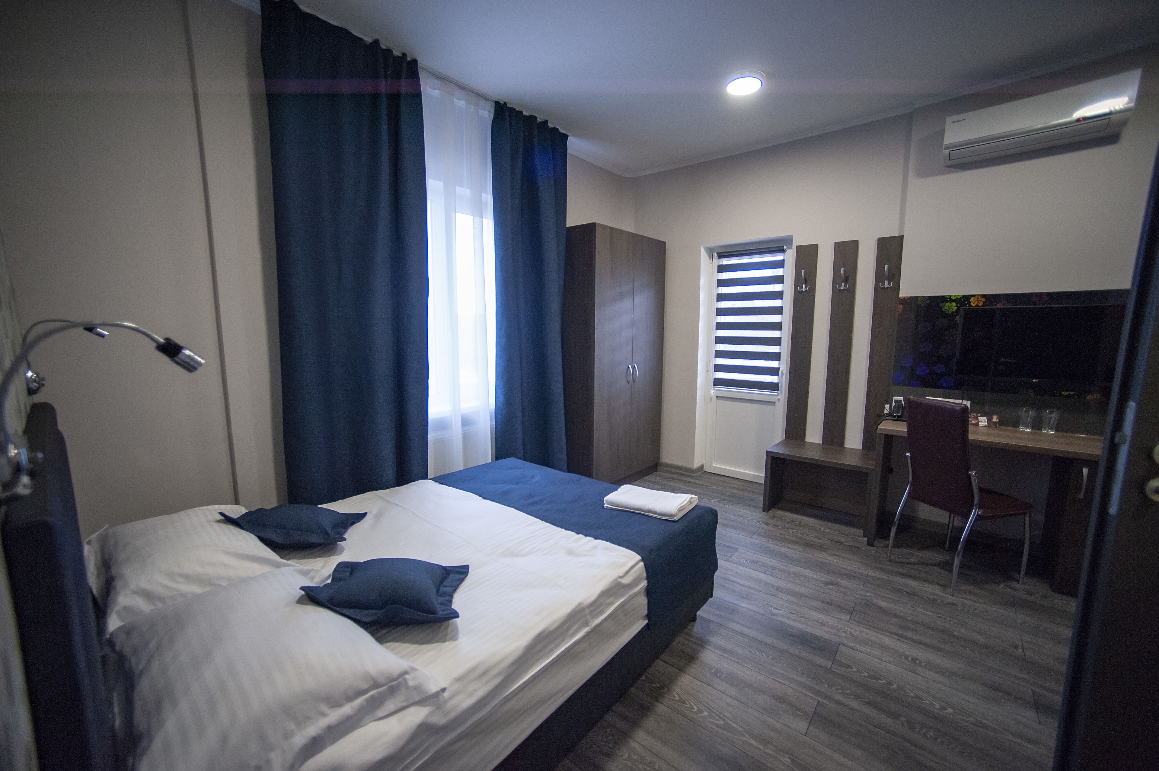 single room | pillow-top beds, minibar, desk, laptop workspace