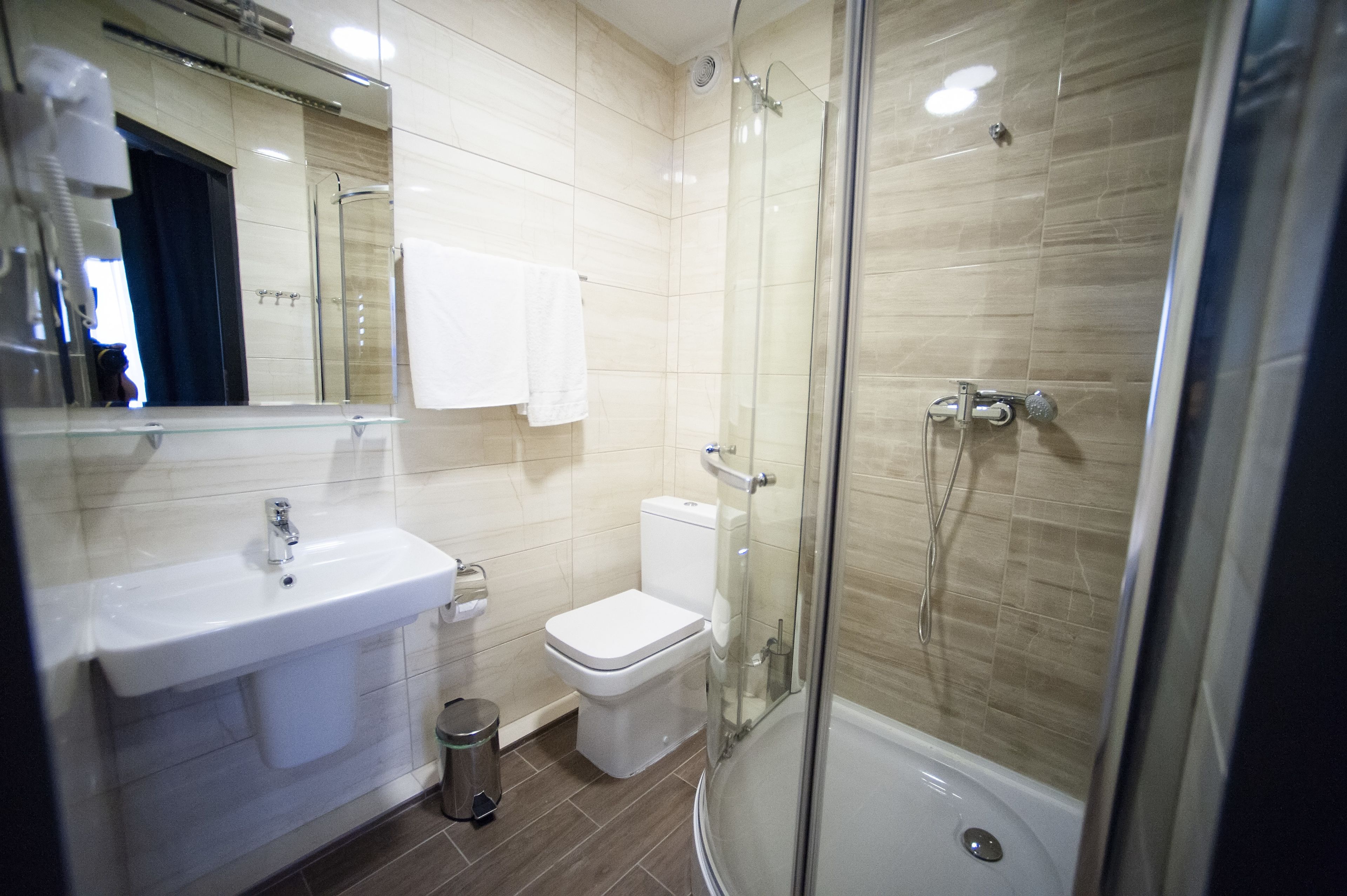single room | bathroom | shower, hair dryer, slippers, towels
