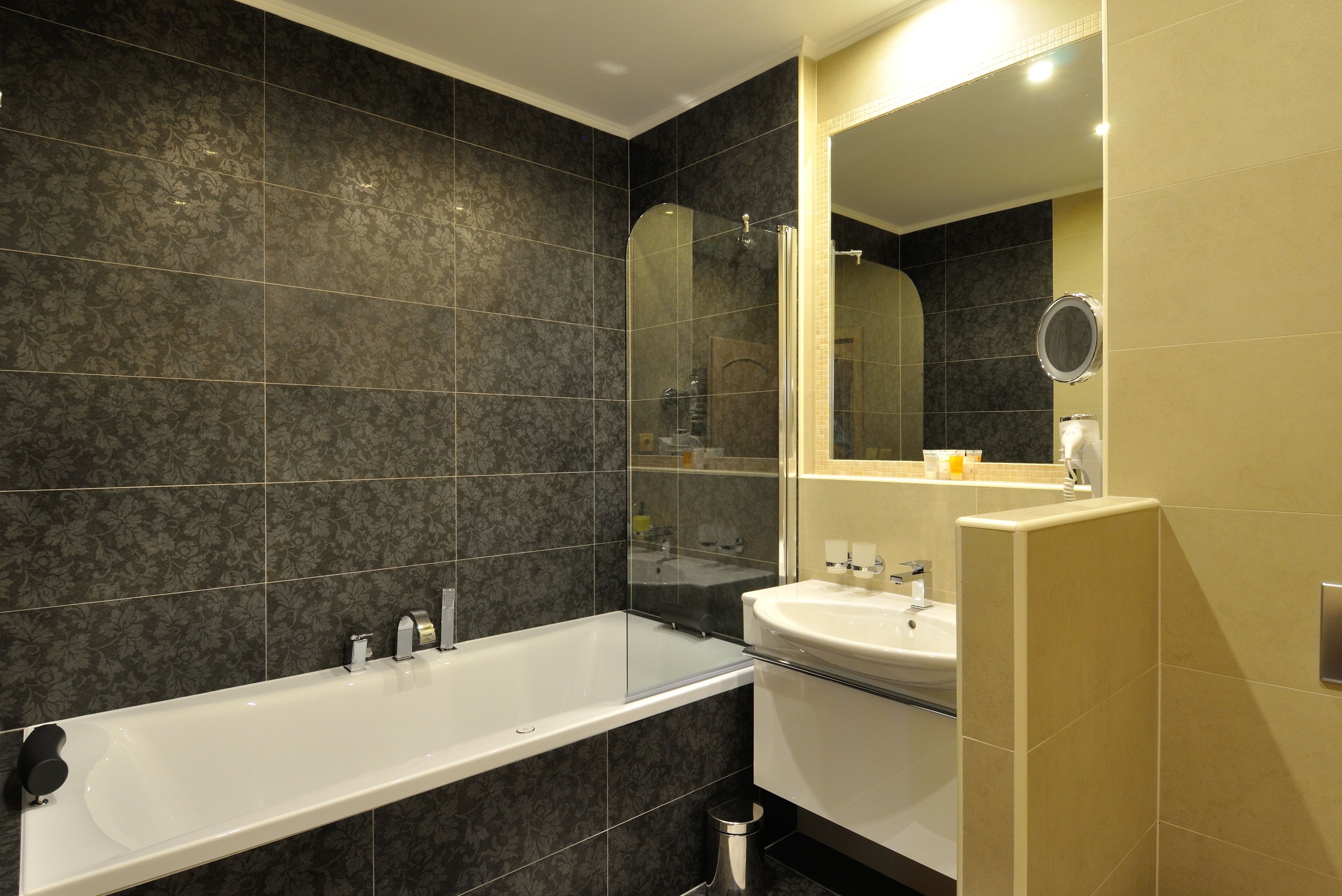 royal apartment, bathtub | bathroom | rainfall showerhead, hair dryer, bathrobes, towels