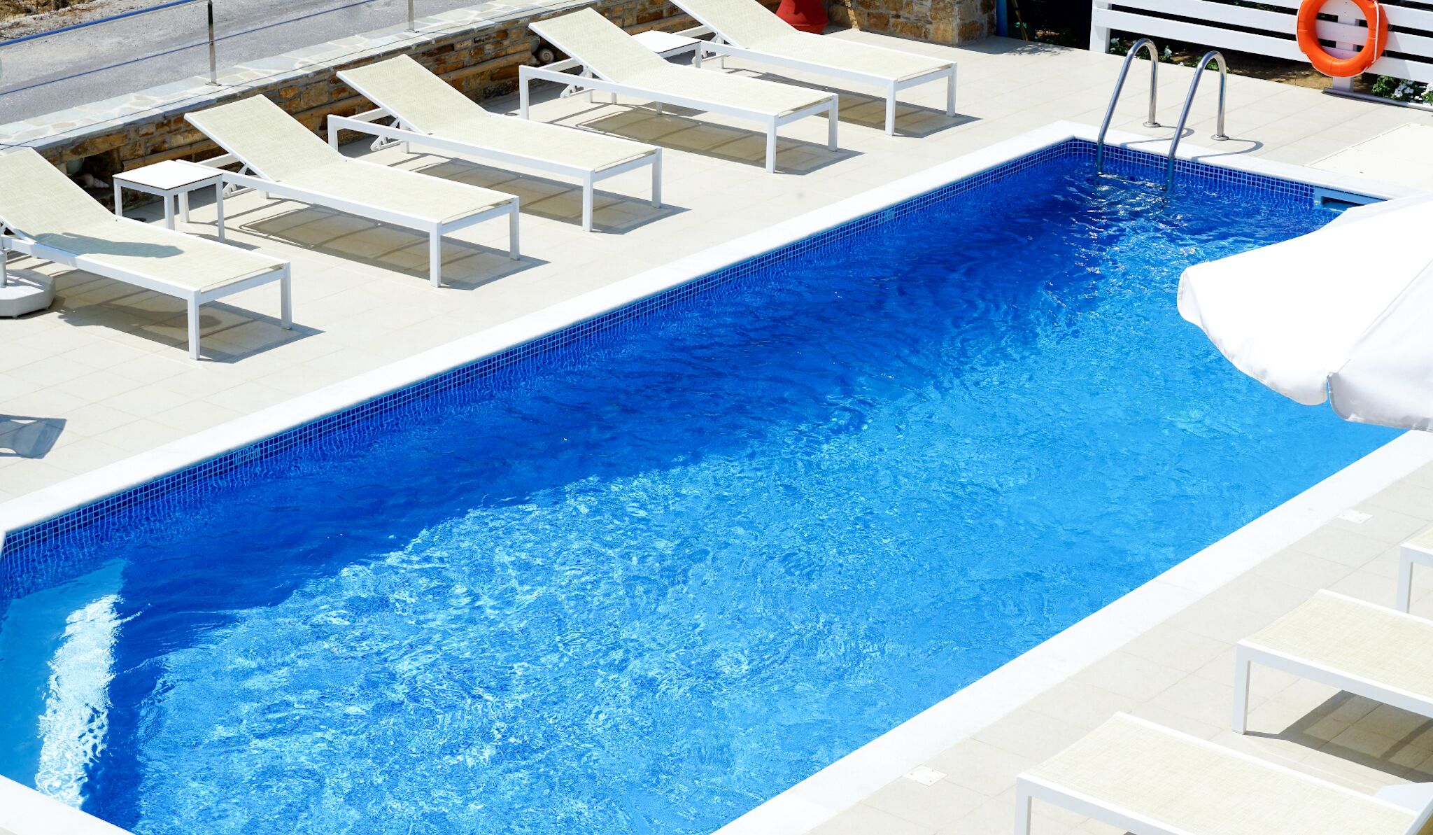 Seasonal outdoor pool, pool umbrellas, sun loungers