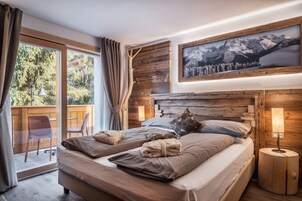 Habitación de lujo doble | Ropa de cama de alta calidad y edredones de plumas