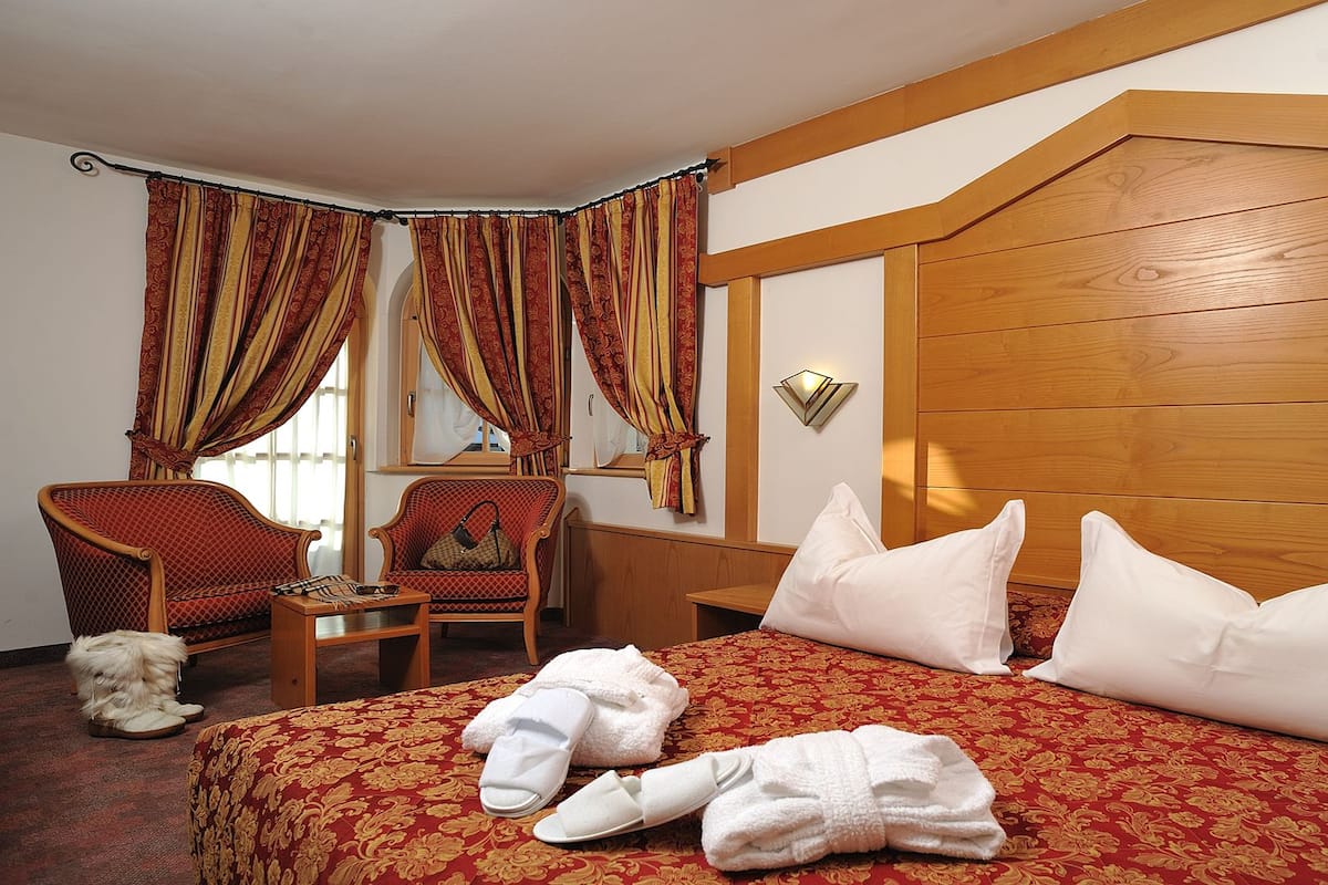 Premium bedding, down duvets, memory-foam beds, minibar