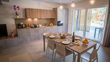 Luxury Villa, Poolside | Private kitchen | Fridge, microwave, stovetop, coffee/tea maker