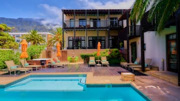 Outdoor pool, pool umbrellas, pool loungers