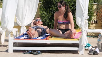 Outdoor pool, pool umbrellas, pool loungers