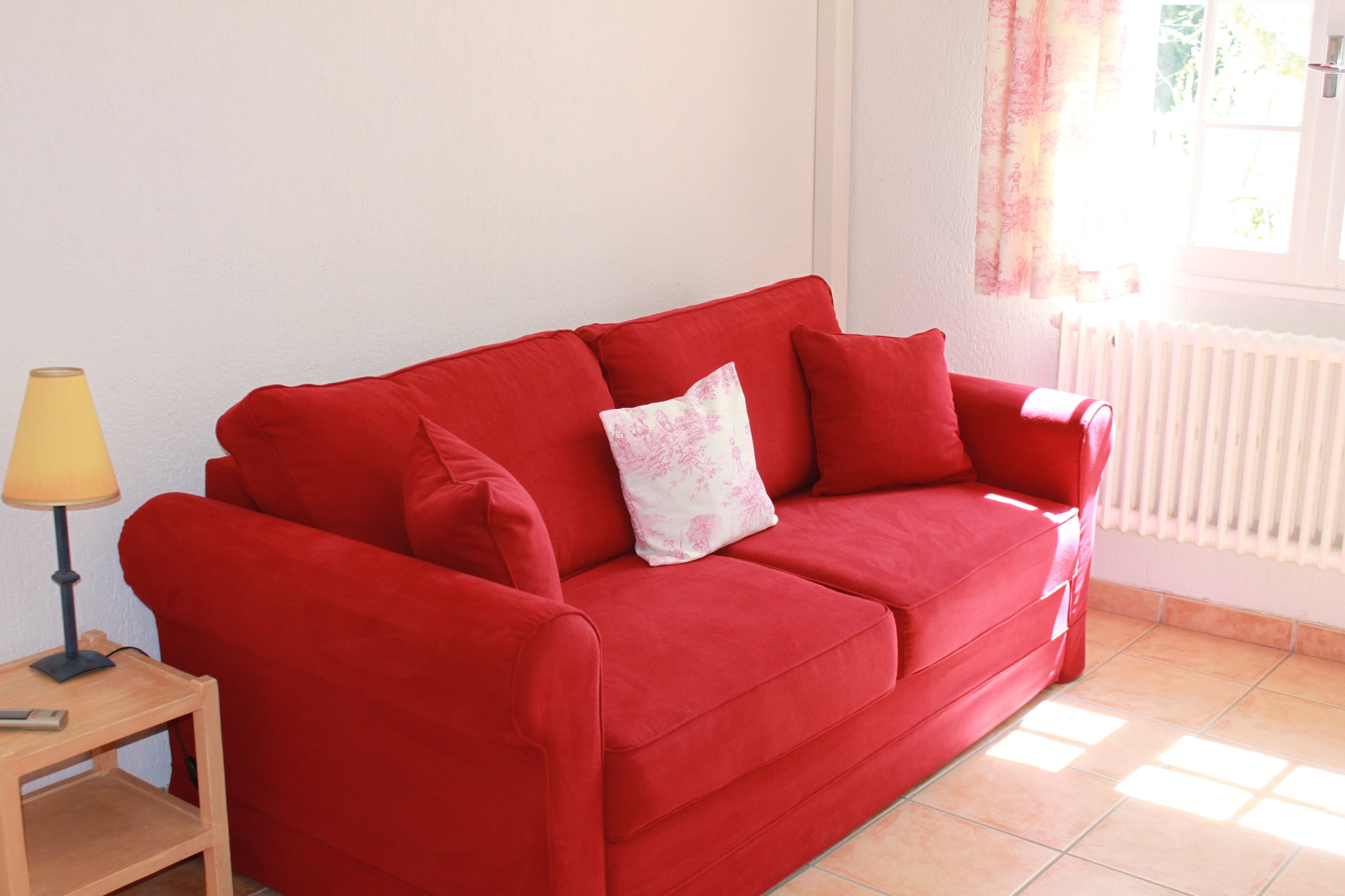 superior double room | living area | flat-screen tv