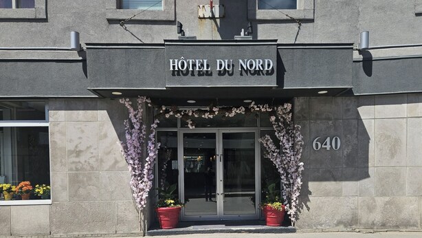 The exterior of HOTEL DU NORD, featuring a modern facade, large glass entrance doors, and the address number 640. - Hôtel du Nord (Québec City)