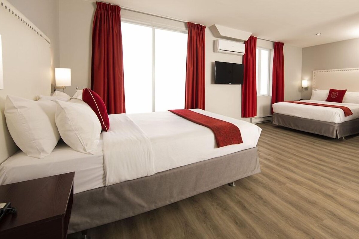 Premium bedding, blackout curtains, soundproofing, iron/ironing board