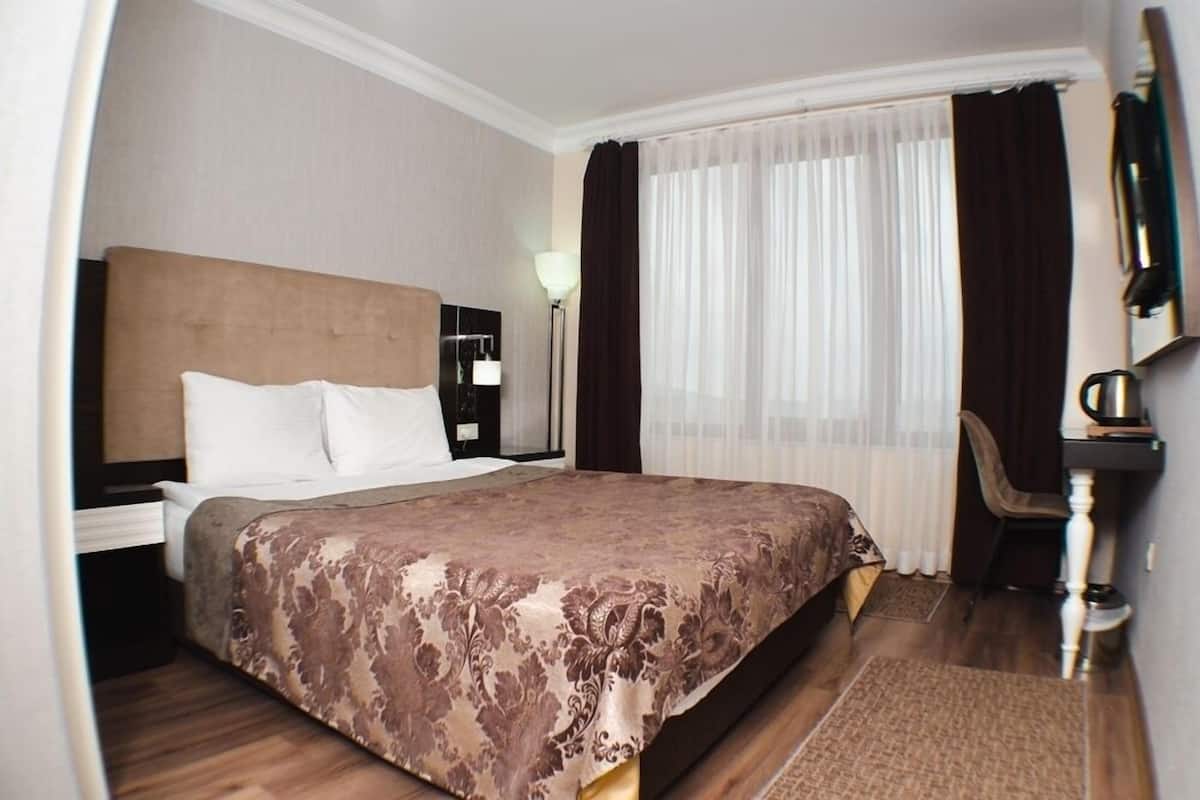 Premium bedding, memory foam beds, minibar, in-room safe