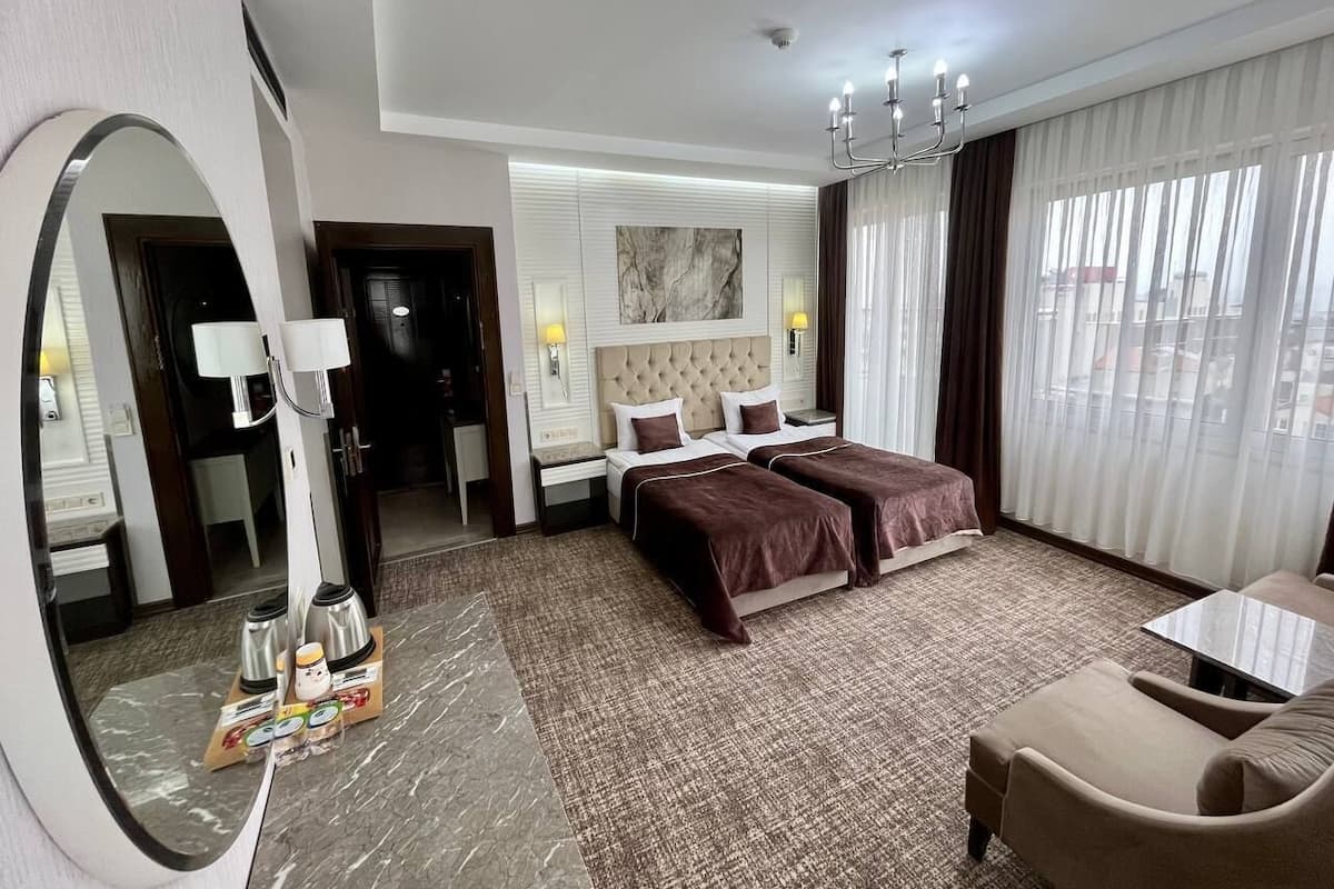 Deluxe-rum - 1 dubbelsäng eller enkelsängar | 1 sovrum, sängtillbehör av högsta kvalitet och memory foam-madrasser