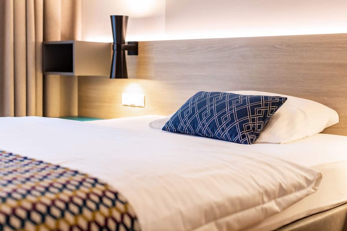 Comfort Room, 1 Queen Bed, Kitchenette, Annex Building | Hypo-allergenic bedding, in-room safe, desk, laptop workspace