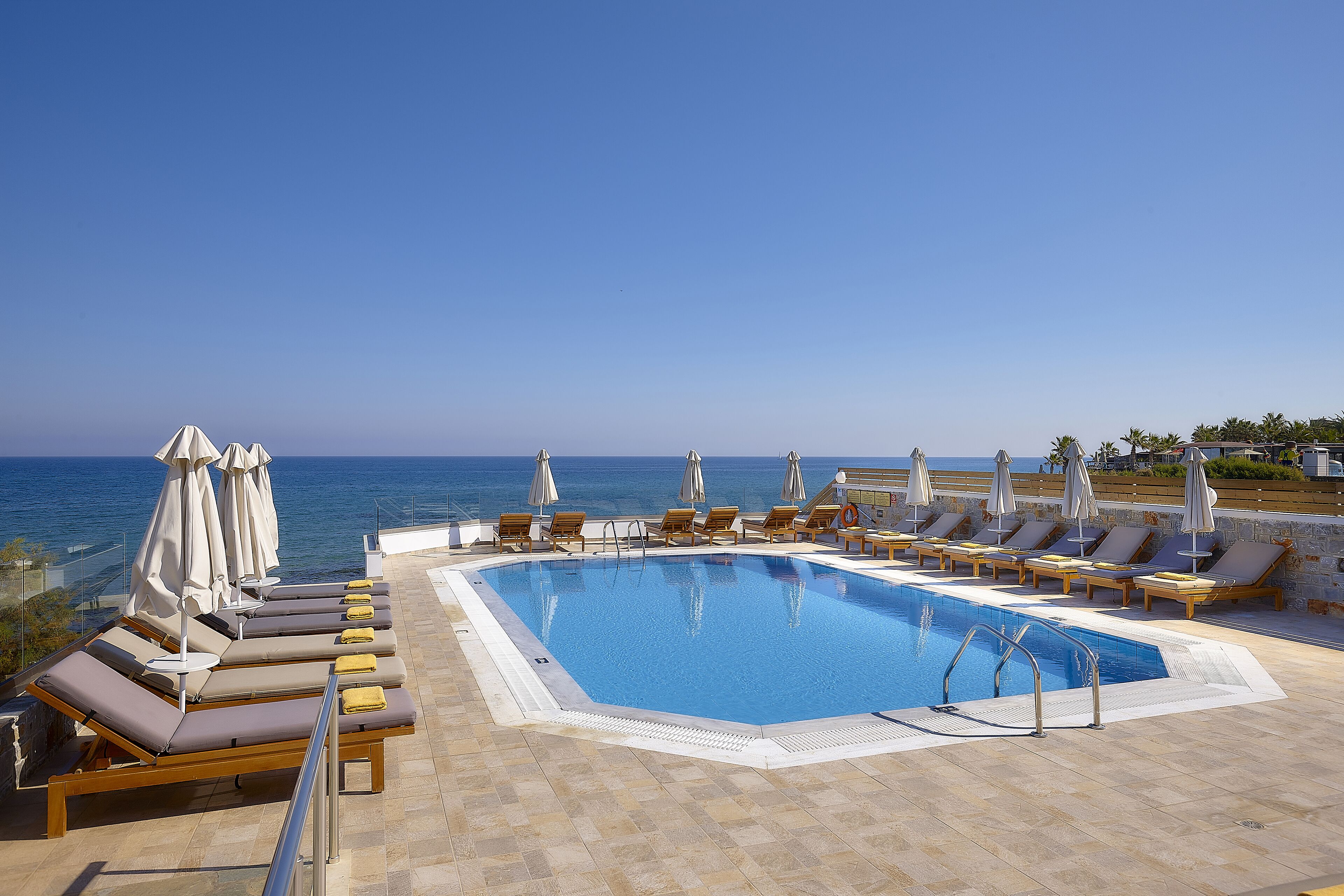 indoor pool, 5 outdoor pools, open 10:00 am to 6:00 pm, pool umbrellas