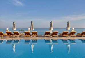 Indoor pool, 4 outdoor pools, open 10:00 AM to 6:00 PM, pool umbrellas