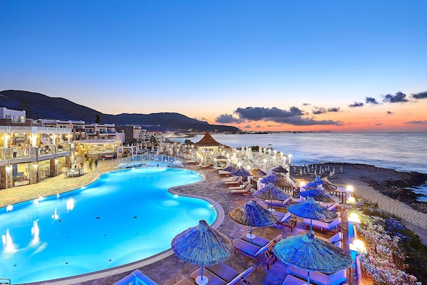 Indoor pool, 4 outdoor pools, open 10:00 AM to 6:00 PM, pool umbrellas