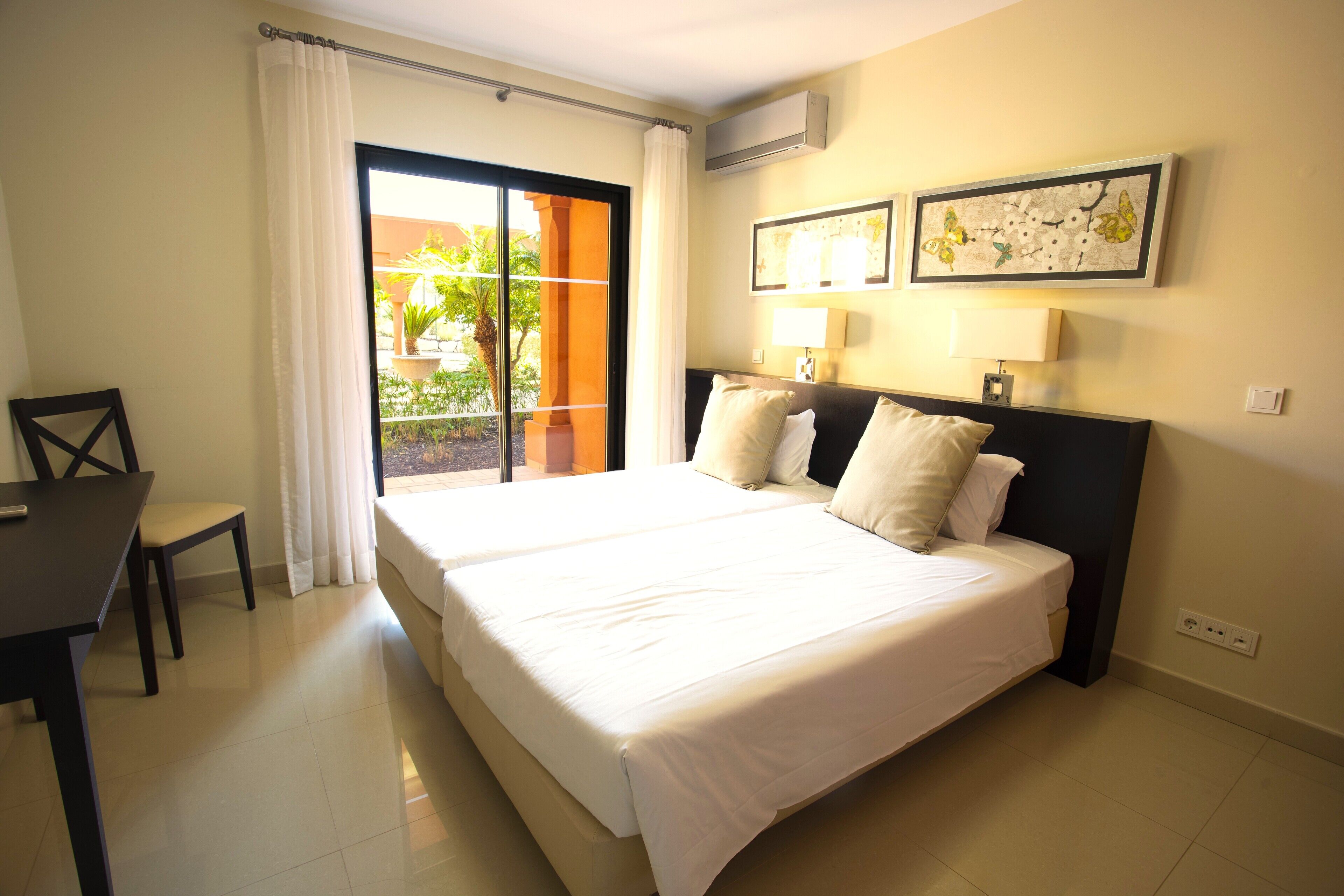 Apartment, 1 Bedroom | 1 bedroom, in-room safe, individually decorated, individually furnished