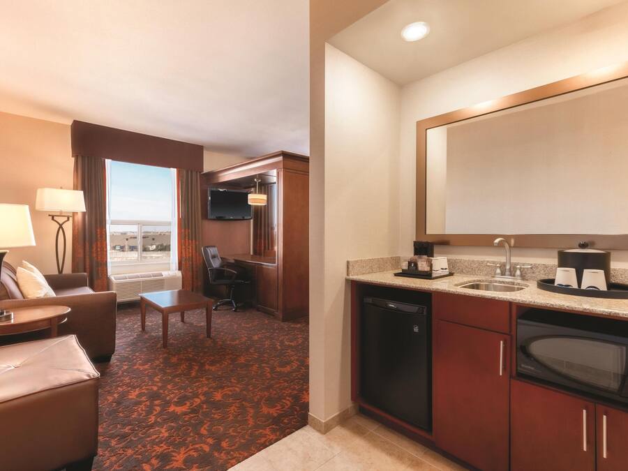 King Studio Suite | Living area | 55-inch LED TV with cable channels, TV, MP3 dock