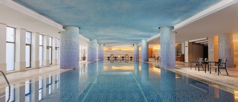 Indoor pool, open 7:30 AM to 11:00 PM, sun loungers, lifeguards on site