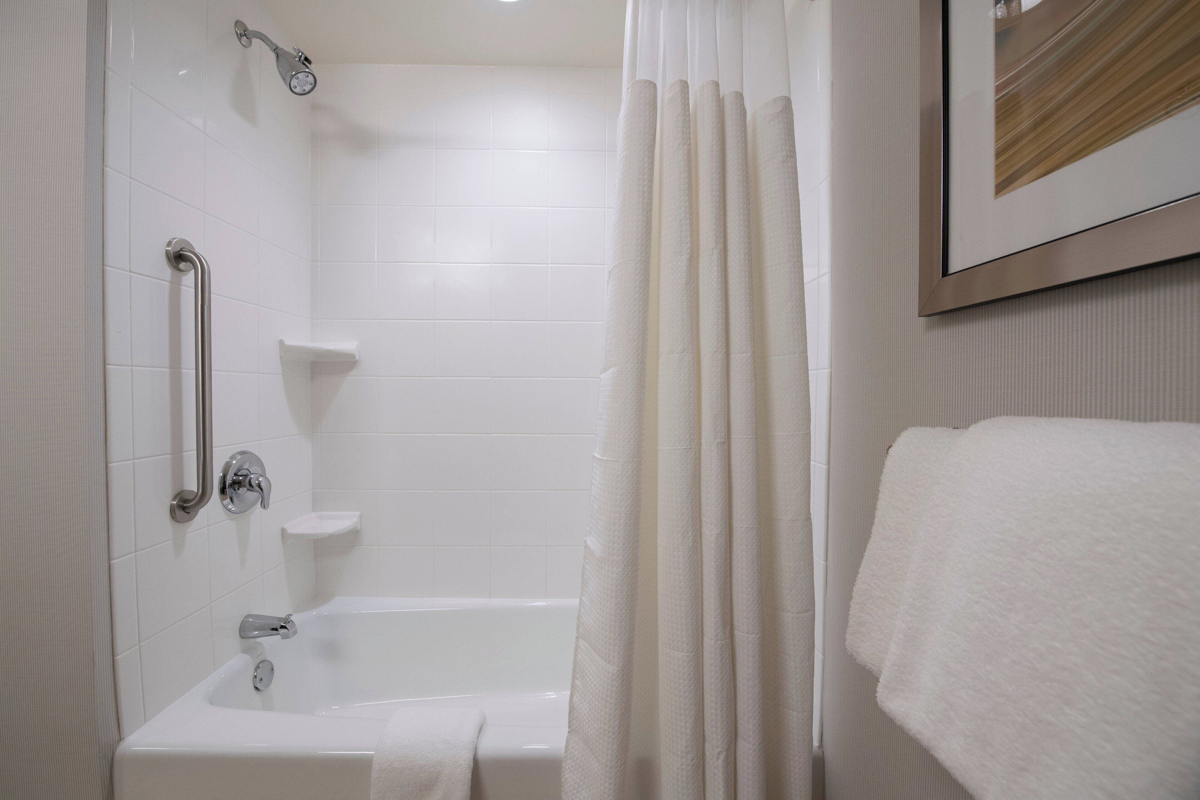 combined shower/bathtub, free toiletries, hair dryer, bathrobes