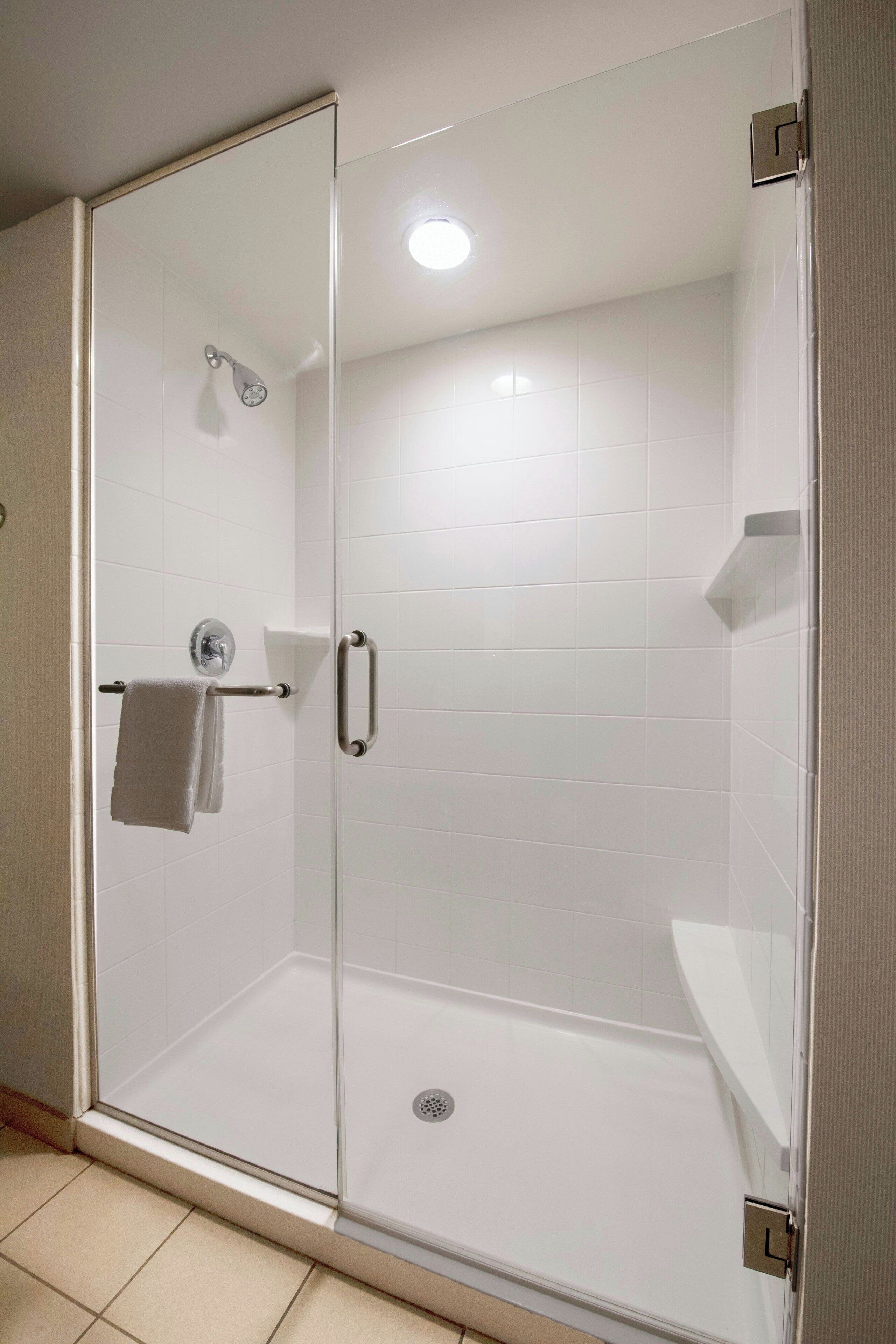 combined shower/bathtub, free toiletries, hair dryer, bathrobes