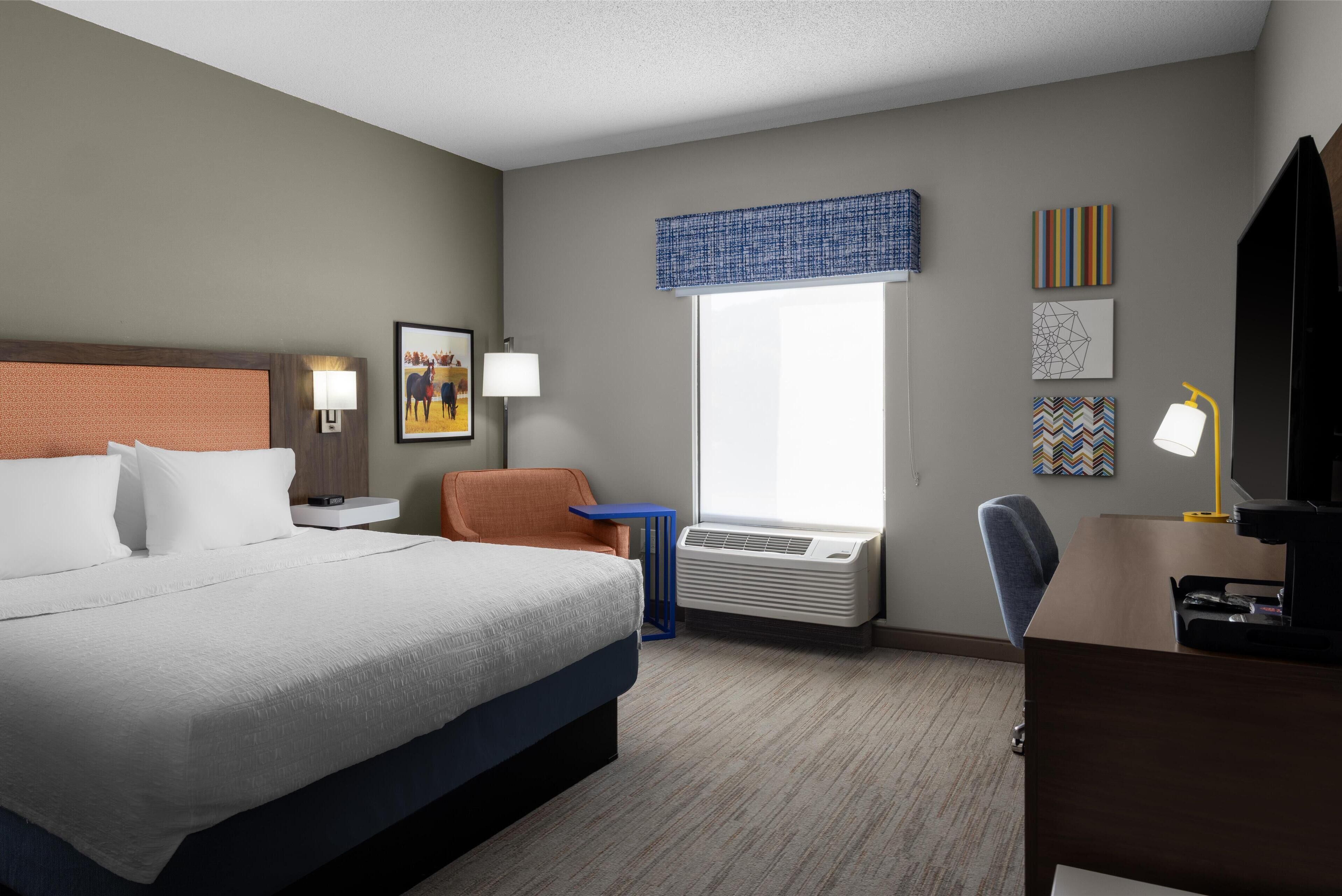 room, 1 king bed | in-room safe, desk, iron/ironing board, free cots/infant beds