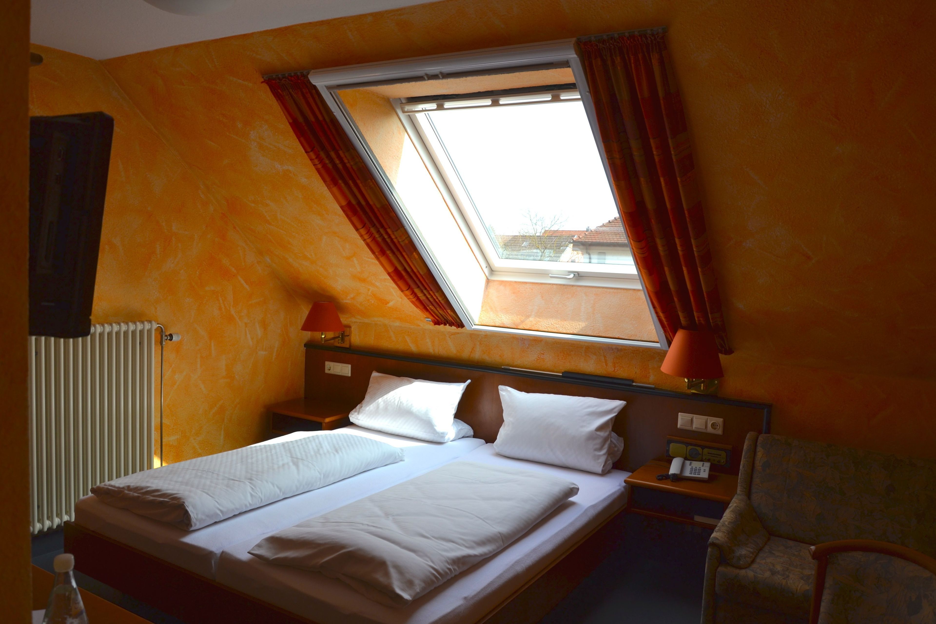 hypo-allergenic bedding, desk, blackout curtains, free cots/infant beds